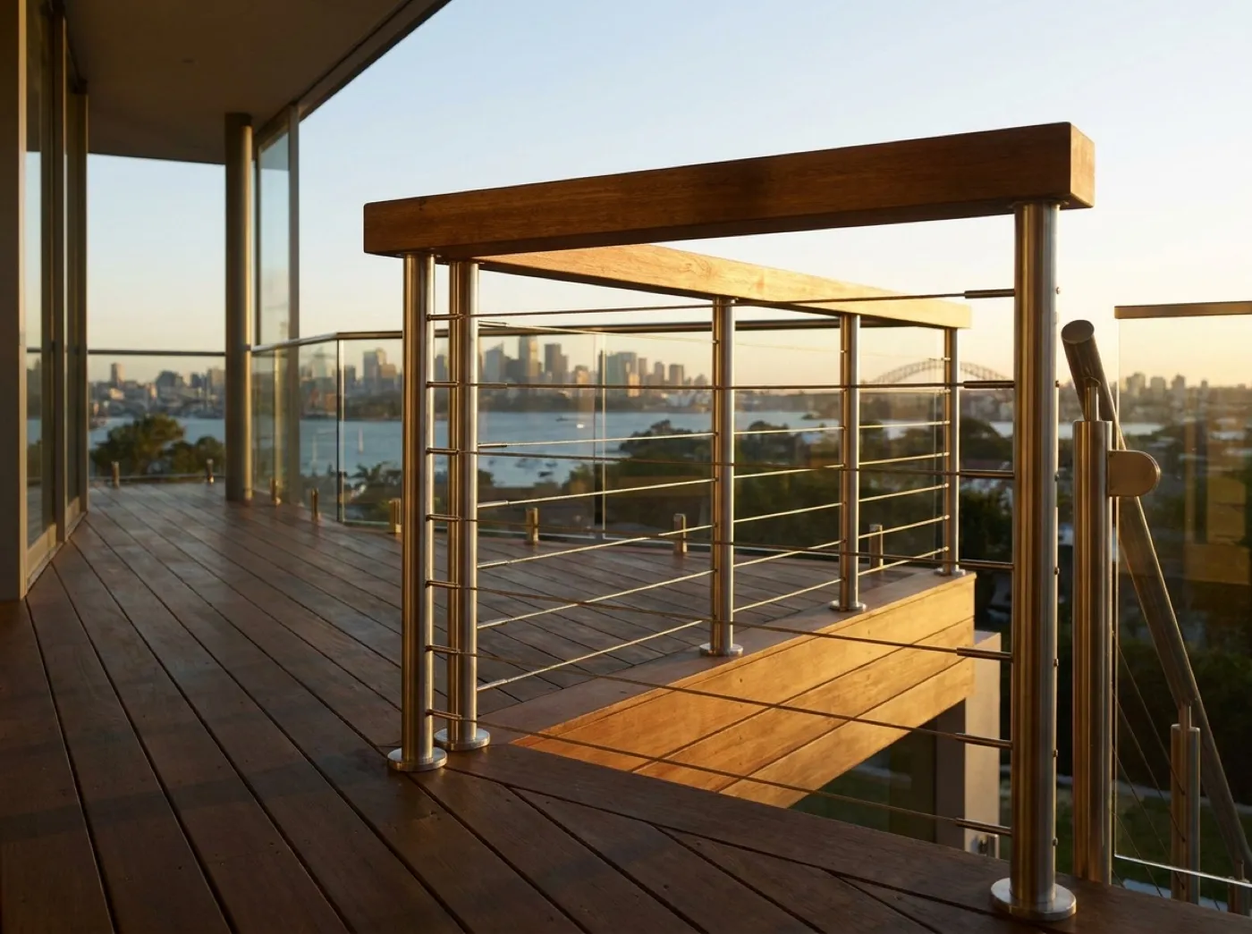Stainless wire balustrade on a deck with harbour view